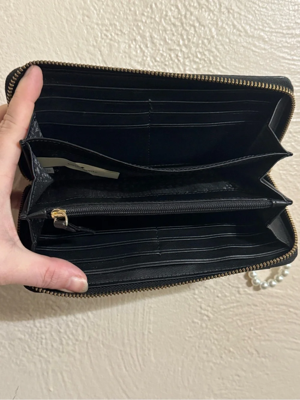 kate spade Black and White Check Zip-Around Wristlet with Pearl Strap
